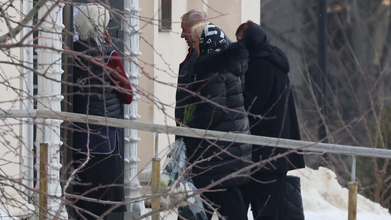 Lyudmila Navalnaya (R) and Anatoly Navalny, parents of late Russian opposition leader Alexei Navalny, enter the Mother of God Quench My Sorrows church to attend his funeral service, in Moscow's district of Maryino on March 1, 2024. (Photo by STRINGER / AFP)