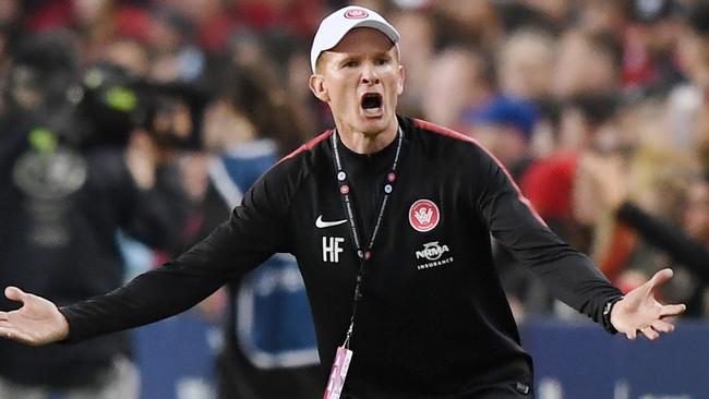 Wanderers caretaker coach Hayden Foxe reacts after Sydney are awarded a penalty during the round 3 A-League football match between Sydney FC and Western Sydney Wanderers at the Allianz Stadium in Sydney, Saturday, October 21, 2017. (AAP Image/David Moir) NO ARCHIVING, EDITORIAL USE ONLY
