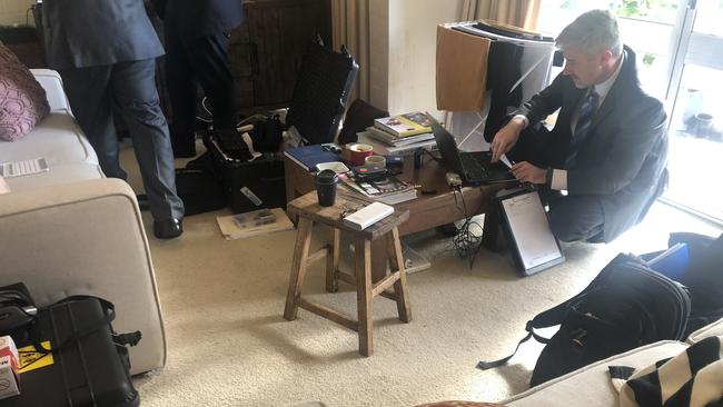 Federal police going through Annika Smethurst’s home in Canberra. Picture supplied