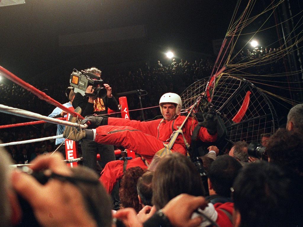 ‘Fan Man’ James Miller lands ringside during the Riddick Bowe v Evander Holyfield boxing fight.Picture: Supplied.