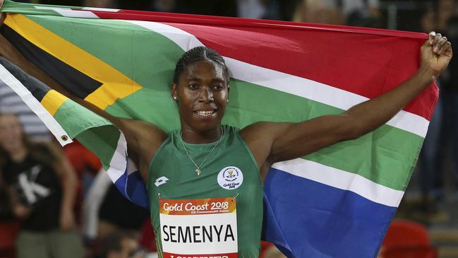 Caster Semenya with the South African flag after winning the 1500m.