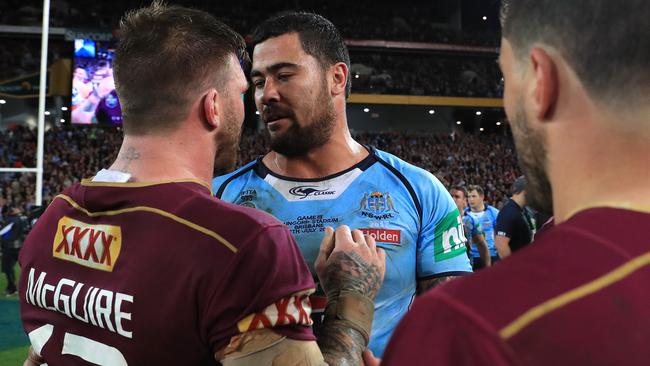 Josh McGuire and Fifita make up after the game. Photo: Adam Head