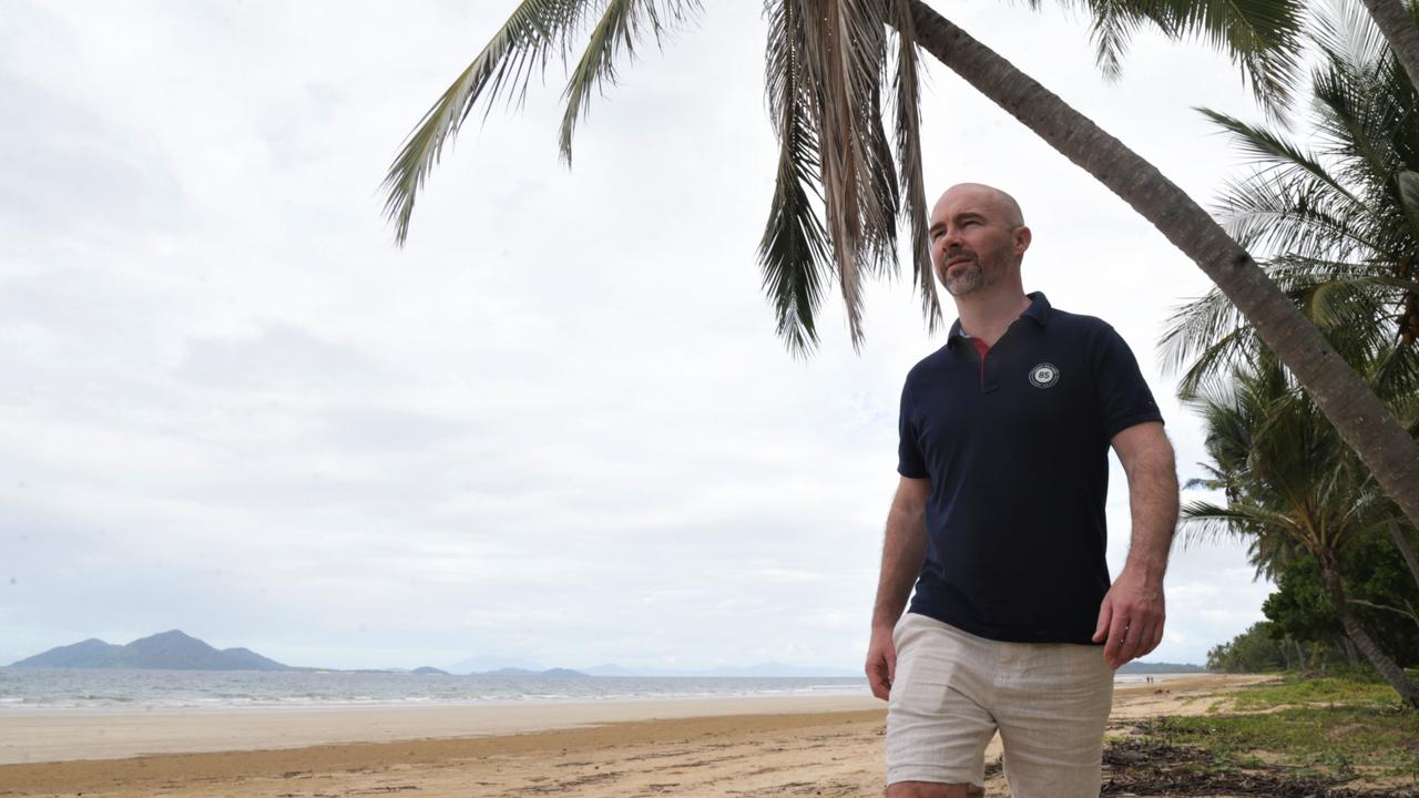 Mayfair 101 managing director James Mawhinney at Mission Beach with Dunk Island in the background. Picture: Peter Carruthers