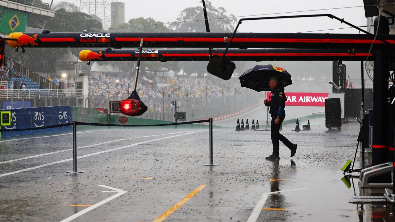 SAO PAULO, BRAZIL - NOVEMBER 02: Rain falls outside the Oracle Red Bull Racing garage prior to qualifying ahead of the F1 Grand Prix of Brazil at Autodromo Jose Carlos Pace on November 02, 2024 in Sao Paulo, Brazil. (Photo by Mark Thompson/Getty Images)