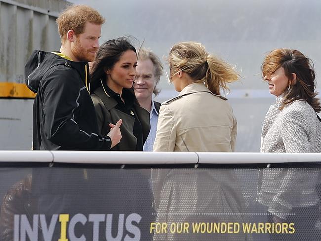 Britain's Prince Harry and his fiancee Meghan Markle, second left, attend the UK team trials for the Invictus Games Sydney 2018 at the University of Bath. Picture: AP