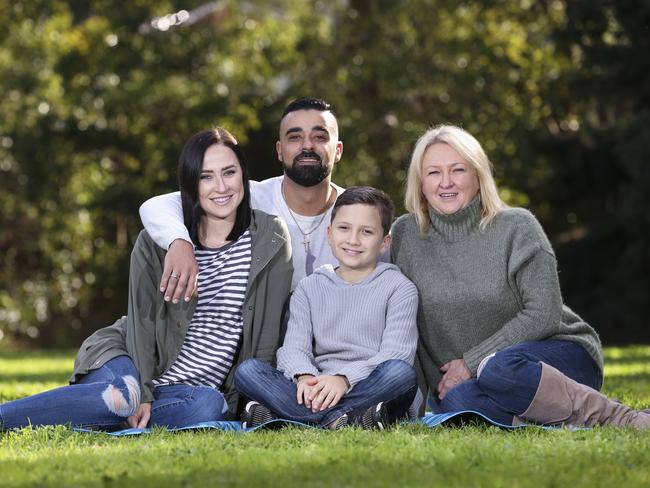 Cancer survivor Chloe Simmons with husband Dimitri Pixomatis, son Isaac Tasic and mum Sherrie Zammit in Ryde. Picture: Justin Lloyd