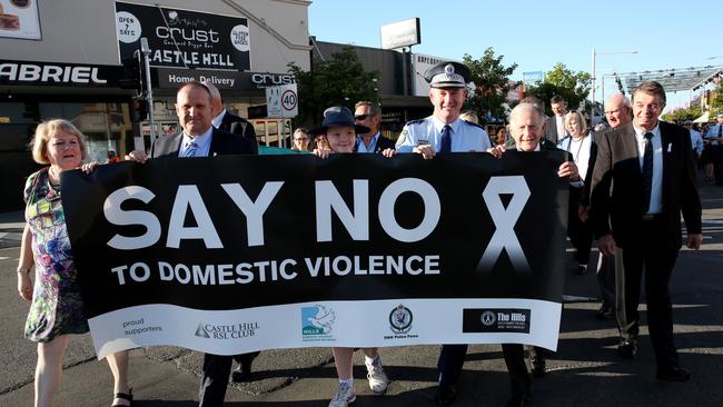 Locals from across the Hills showed their support for White Ribbon Day by marching through Castle Hill on Friday. Pictures: Peter Kelly