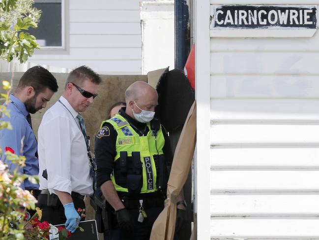 NO BYLINE Tasmania Police present at the scene where a man was badly bashed overnight in New Town. NO BYLINE