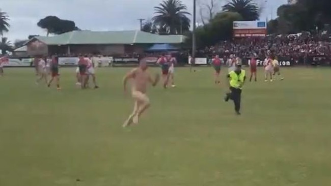 A streaker runs on to the ground during the last quarter of the MPNFL Grand Final. Picture: Twitter/@vanhaighendorf