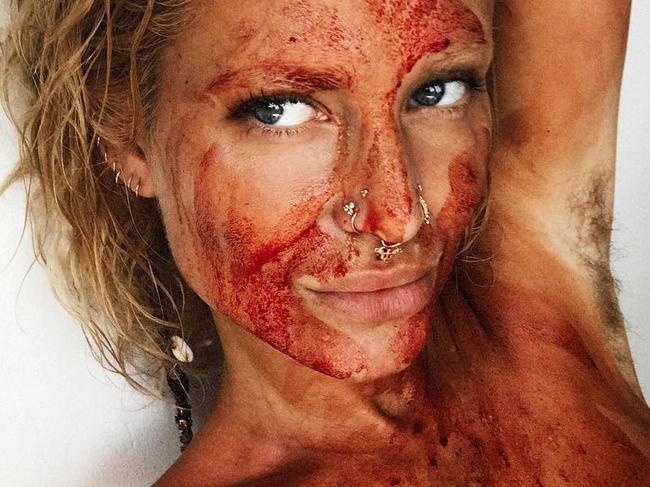 Naturist smears her period blood all over her face and chest to promote ‘acceptance and love’