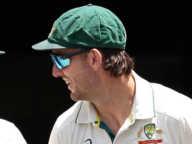 MELBOURNE, AUSTRALIA - DECEMBER 30: Travis Head, Mitchell Marsh and Pat Cummins of Australia walk out from the players race during day five of the Men's Fourth Test Match in the series between Australia and India at Melbourne Cricket Ground on December 30, 2024 in Melbourne, Australia. (Photo by Robert Cianflone/Getty Images)