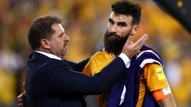 Ange Postecoglou and Mile Jedinak after Australia defeated Honduras. Picture: Getty Images