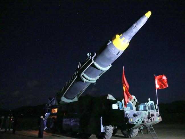 North Korean leader Kim Jong-un inspects a ground-to-ground medium long-range strategic ballistic rocket Hwasong-12 at an undisclosed location. Picture: AFP/KCNA via KNS