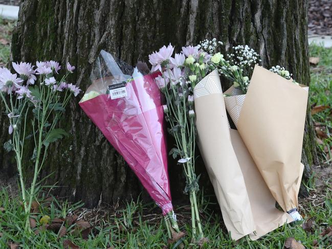 Flowers are left at Baimbridge College after the crash. Picture: David Crosling