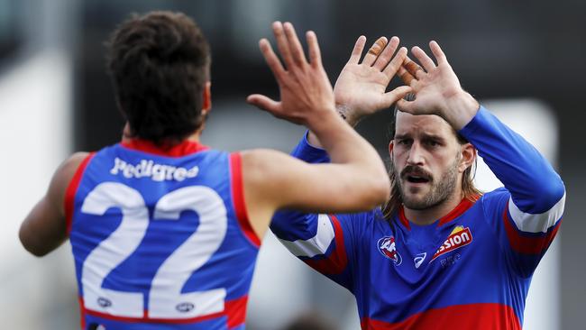 Josh Bruce celebrates a goal with Jamarra Ugle-Hagan. Picture: Getty Images