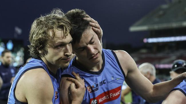 Jack Stephens (right) gets consoled by Tom Harms after his final game for Sturt last year. Picture: Sarah Reed