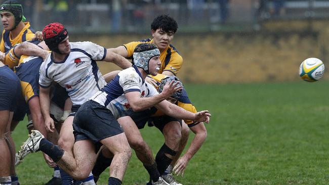 NSW's Joe Hutton gets the ball away against ACT.