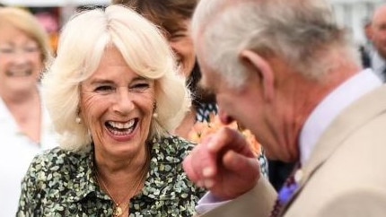 Queen Camilla has had a cheeky dig at King Charles over his likeness to a pie. Picture: Getty Images via AFP