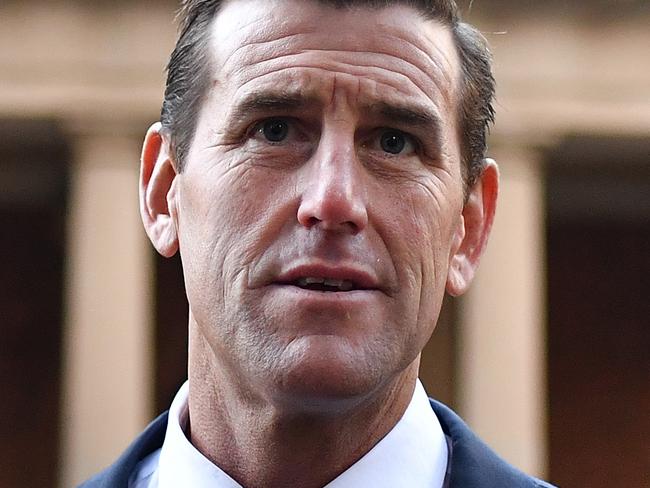 SYDNEY, AUSTRALIA - JUNE 07: Ben Roberts-Smith arrives at the Federal Court of Australia in Sydney on June 07, 2021 in Sydney, Australia. Ben Roberts-Smith is suing three Fairfax newspapers for defamation over reports he committed war crimes while serving in the Australian Special Air Services in Afghanistan. Ben Roberts-Smith is Australia's most decorated living soldier and a Victoria Cross recipient. (Photo by Sam Mooy/Getty Images)