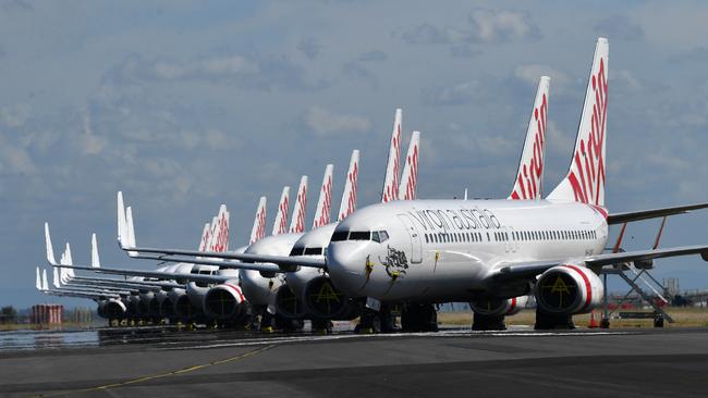 Virgin Australia is set to have a new owner within days, and the lead bidder has pledged an allegiance to Queensland. (AAP Image/Darren England)