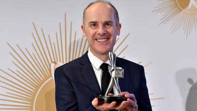 Tom Gleisner from Have You Been Paying Attention? poses for a photo with the Logie for the most outstanding entertainment program during the last year’s Logie Awards on the Gold Coast. Picture: AAP Image/Darren England