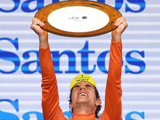 South African rider Daryl Impey of team Mitchelton-Scott celebrates winning the Tour Down Under in Adelaide, Sunday, January 21, 2018. (AAP Image/Dan Peled) NO ARCHIVING, EDITORIAL USE ONLY