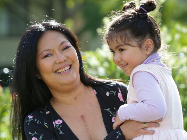 Marie Domingo with her daughter Faith, 3, at their home in Thornton, near Maitland, was 27 weeks pregnant when she got the flu that damaged her heart and she needed a transplant.