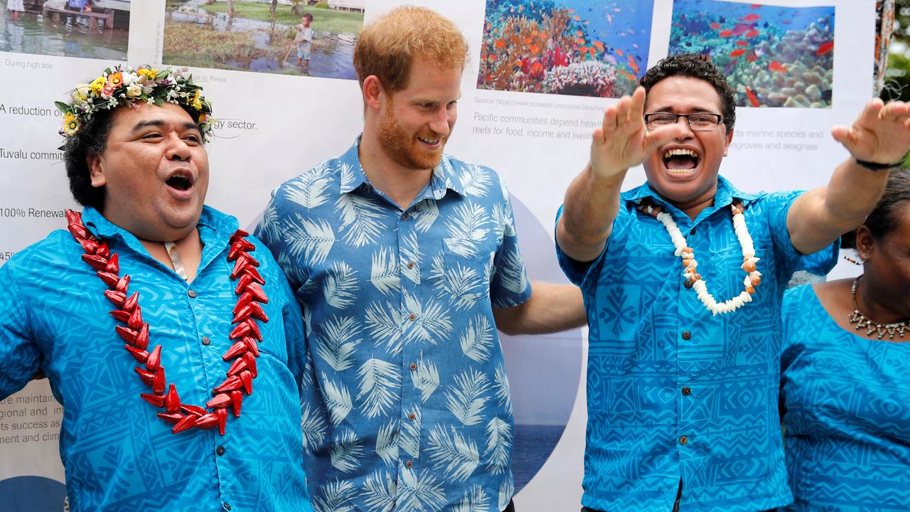 Prince Harry meets enthusiastic students at the University of the South Pacific in Suva, Fiji. Picture: Phil Noble.