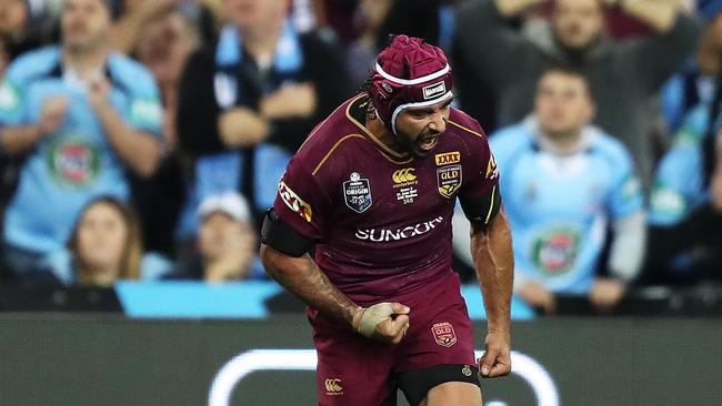 Johnathan Thurston after kicking the winning goal in Origin II last year. Picture: Brett Costello