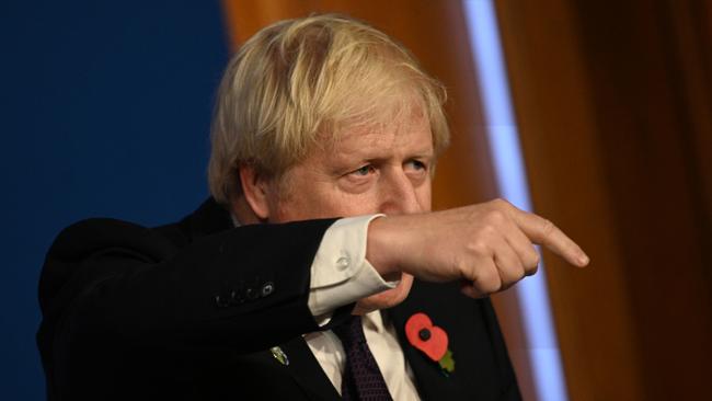 UK Prime Minister Boris Johnson gestures as he speaks during a press conference in London. Picture: Getty Images