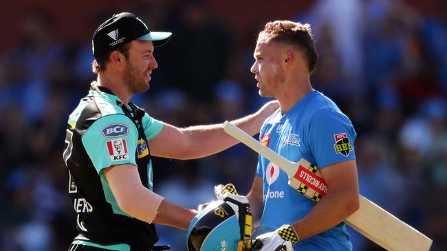 ADELAIDE, AUSTRALIA - JANUARY 17: AB de Villiers of the Heat congratulates Phil Salt of the Strikers after he hit the winning runs during the Big Bash League match between the Adelaide Strikers and the Brisbane Heat at the Adelaide Oval on January 17, 2020 in Adelaide, Australia. (Photo by Matt King/Getty Images)