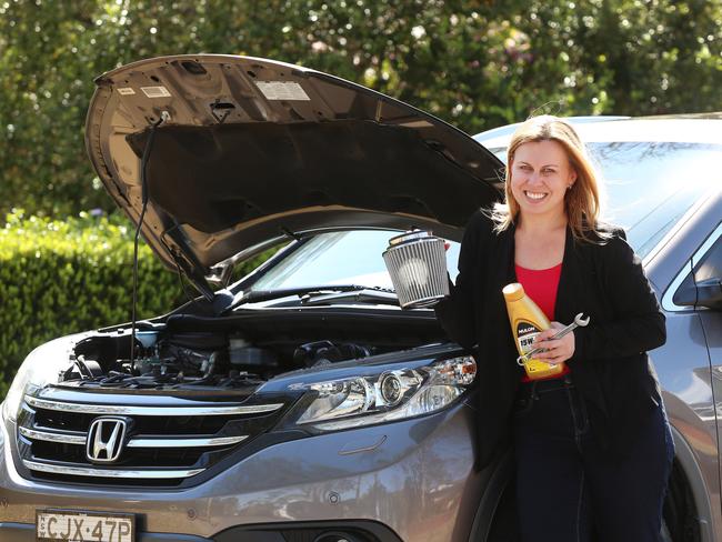 Amanda Tucker pictured with her car at Beecroft.Amanda saves money at the mechanics by buying replacement parts herself at having mechanic install them. Pic Sue Graham