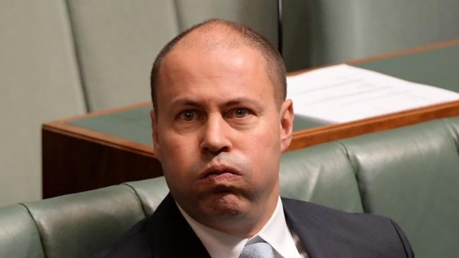 CANBERRA, AUSTRALIA - FEBRUARY 21: Josh Frydenberg holds his breath as he sits down during a vote to suspend standing orders in the House of Representatives at Parliament House on February 21, 2019 in Canberra, Australia. Attorney General Christian Porter has announced new legal advice new medevac legislation has highlighted a loophole that will stop asylum seekers being returned after medical treatment, which could see asylum seekers detained indefinitely on Christmas Island. The controversial bill passed Federal Parliament last week with support of Labor, the Greens and the crossbench, handing the Federal Government an historic defeat. (Photo by Tracey Nearmy/Getty Images)