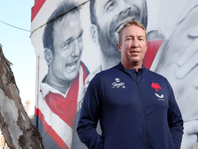 Pictured is Sydney Roosters coach Trent Robinson at club legends mural at Bondi Junction which now includes a portrait of retiring Sydney Roosters co-captain Jake Friend.Picture: Richard Dobson