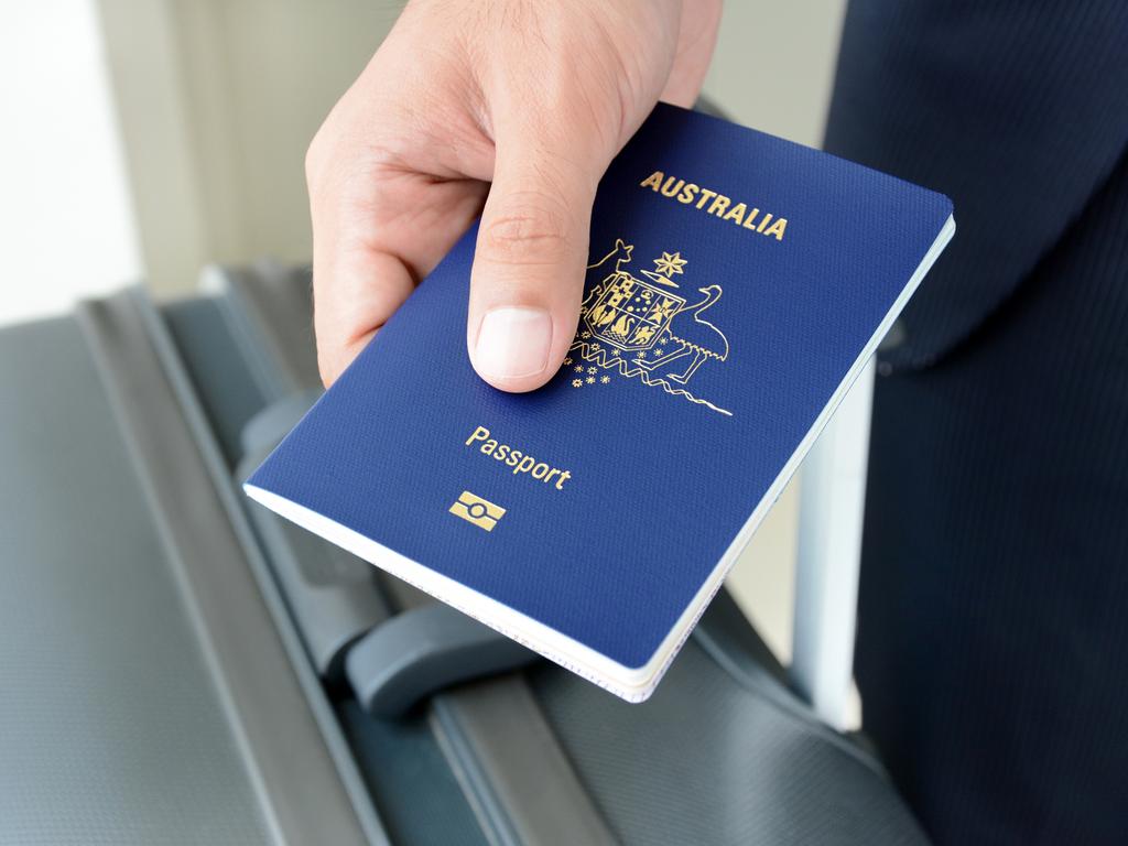 Hands giving passport (of Australia).

Escape 11 August 2024
Doc updates
Photo - iStock
