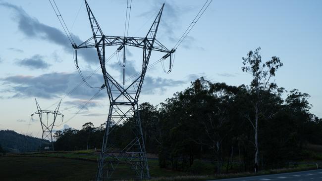 Transmission lines cross Mary Valley Rd near Imbil and Borumba Dam. Picture: Christine Schindler