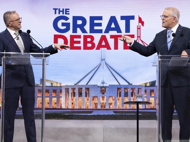 (L-R) Australian opposition leader Anthony Albanese and Australian Prime Minister Scott Morrison debate on live television ahead of the federal election. Picture: Pool/Getty Images