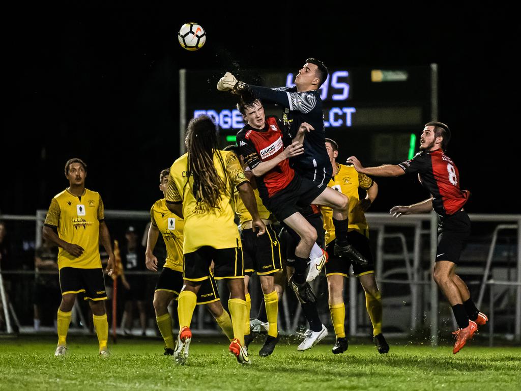 Edge Hill United's Goalkeeper takes control in Saturdays FNQ Premier League grand finals at Endeavour Park. Picture: Emily Barker