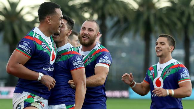 Ken Maumalo (left) celebrates his try saving tackle with Warriors teammate Roger Tuivasa-Sheck during the New Zealand team’s round three NRL victory over St George Illawarra at Central Coast Stadium. Picture: Getty Images