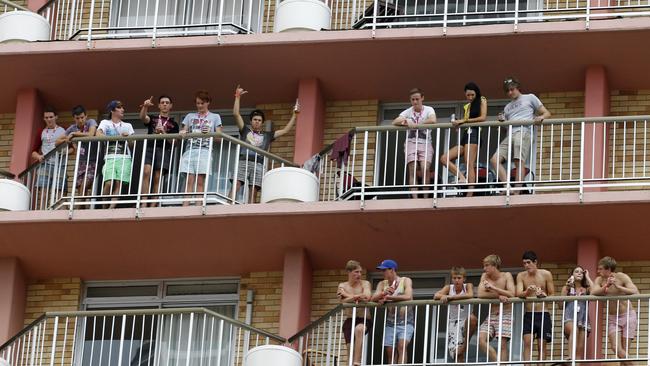 Schoolies celebrating on their balconies in Surfers Paradise. Picture: Jerad Williams.