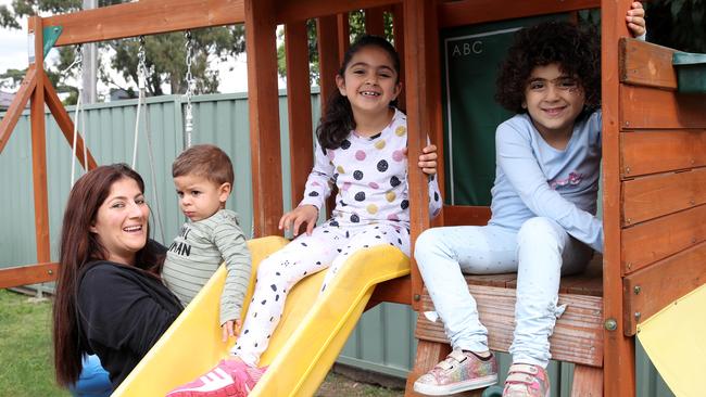 Racquel Bechara with her kids, Nahla, 8, Amelia, 6, and Dorian, 3. Picture: David Swift.