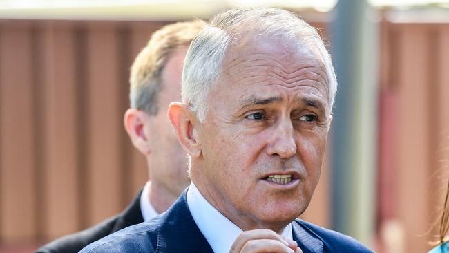 Australian Prime Minister Malcolm Turnbull (centre) speaks to the media during a visit to the Teenie Weenies Learning Centre in Panania with Minister for Women Kelly O'Dwyer (right) and Assistant Minister for Finance David Coleman (obscured) in Sydney, Monday, April 9, 2018. (AAP Image/Brendan Esposito) NO ARCHIVING