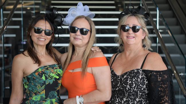 Kat Leon, Alicia Raymond and Nola Ahnfeldt ready for a big day at Darwin Turf Club. Picture: (A)manda Parkinson