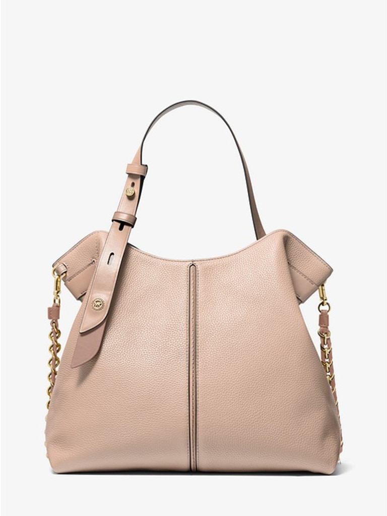 Michael Kor’s Downtown Astor Large Pebbled Leather Shoulder Bag has been reduced to $389 from $649. Picture: Michael Kors.