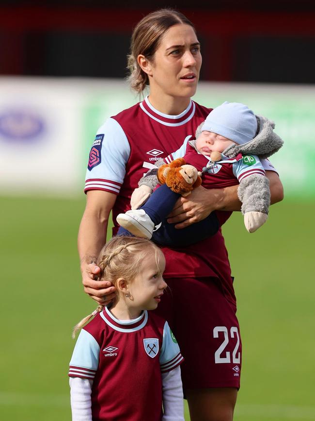 Matildas and West Ham player Gorry on the pitch with her two children Harper and Koby. Picture Instagram