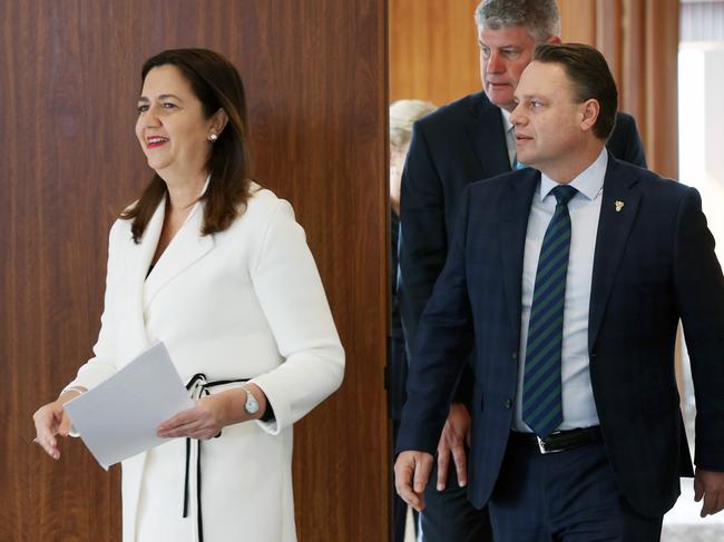 Premier Annastacia Palaszczuk and Lord Mayer Adrian Schrinner arrive at a media conference.