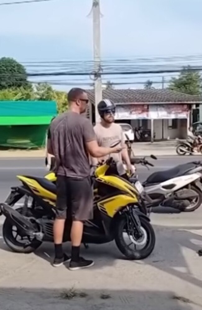 Kiwi brothers Hamish and Oscar Day, 36 and 38, have been arrested in Thailand following a string of alleged traffic offences and police brawl. Picture: YouTube/Thairath Online