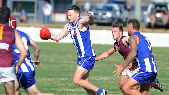 Action in the QAFL match between Mt Gravatt and Palm Beach. Saturday June 12, 2021. Picture, Joh Gass