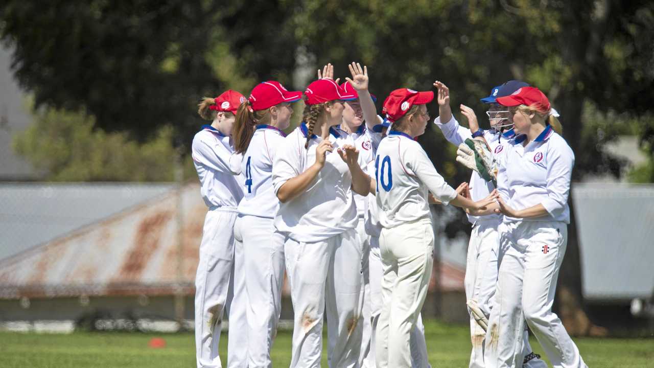 The Darling Downs girls cricket team celebrates a catch by Taylah Baxter in their match against Capricornia in the Queensland School Sport 13-15 years girls cricket championships. Picture: Kevin Farmer