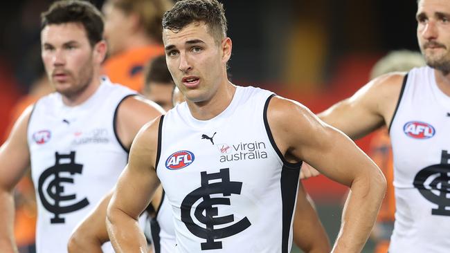 GOLD COAST, AUSTRALIA - SEPTEMBER 03: The Blues look dejected after losing the round 15 AFL match between the Greater Western Sydney Giants and the Carlton Blues at Metricon Stadium on September 03, 2020 in Gold Coast, Australia. (Photo by Chris Hyde/Getty Images)